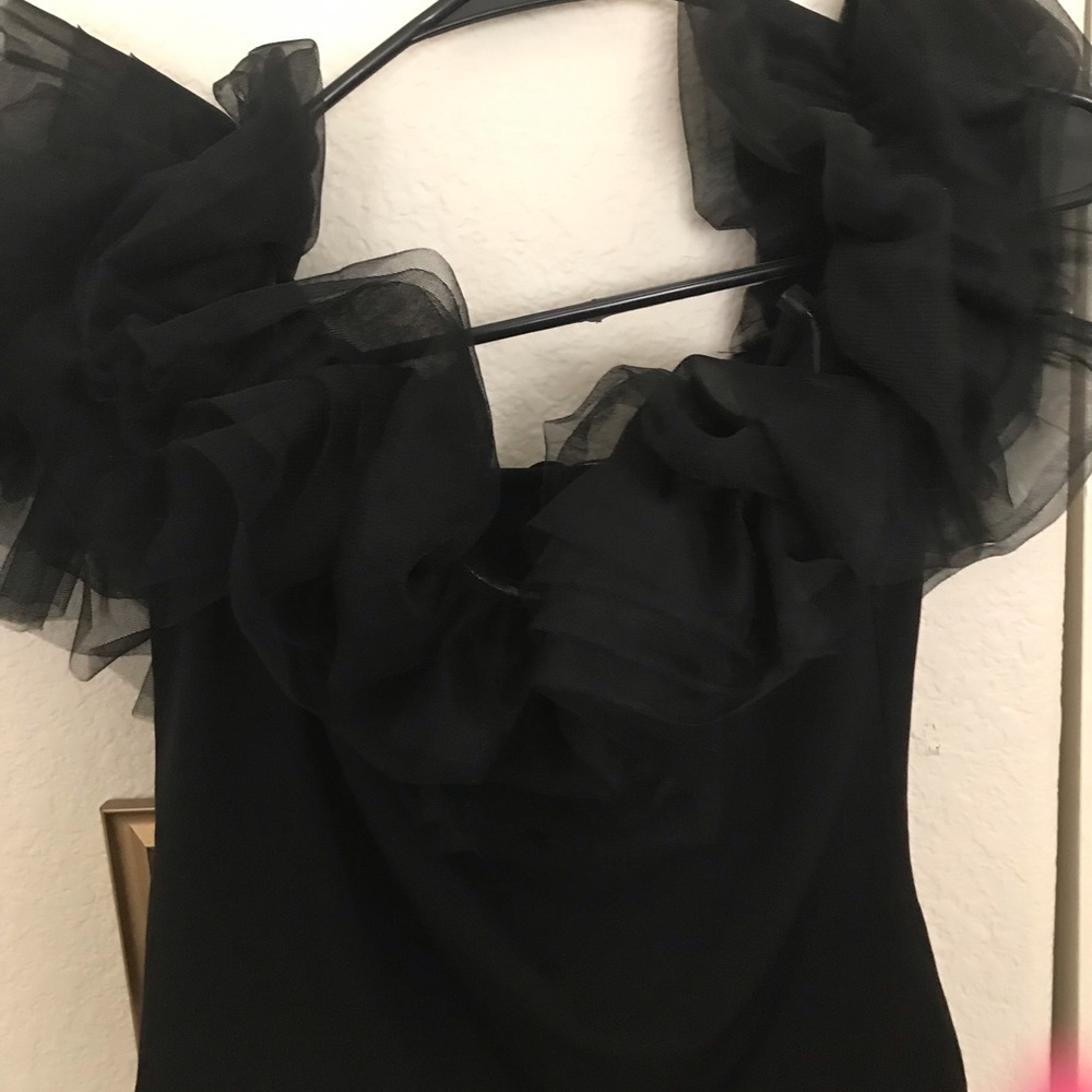 Women’s shirts.   All new and in perfect condition as they were never worn.